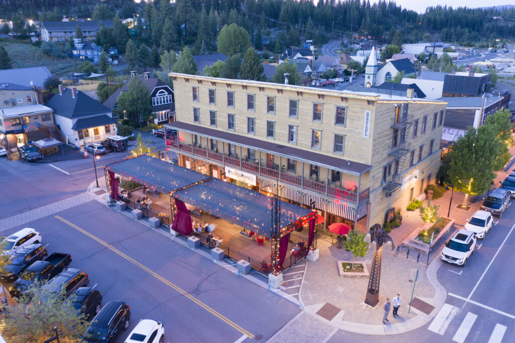 Outdoor dining on Moody's Bar, Bistro & Beats patio