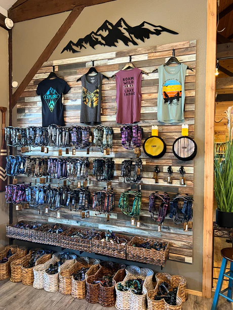 Inside Ruff & Wild showing clothing and dog accessories.