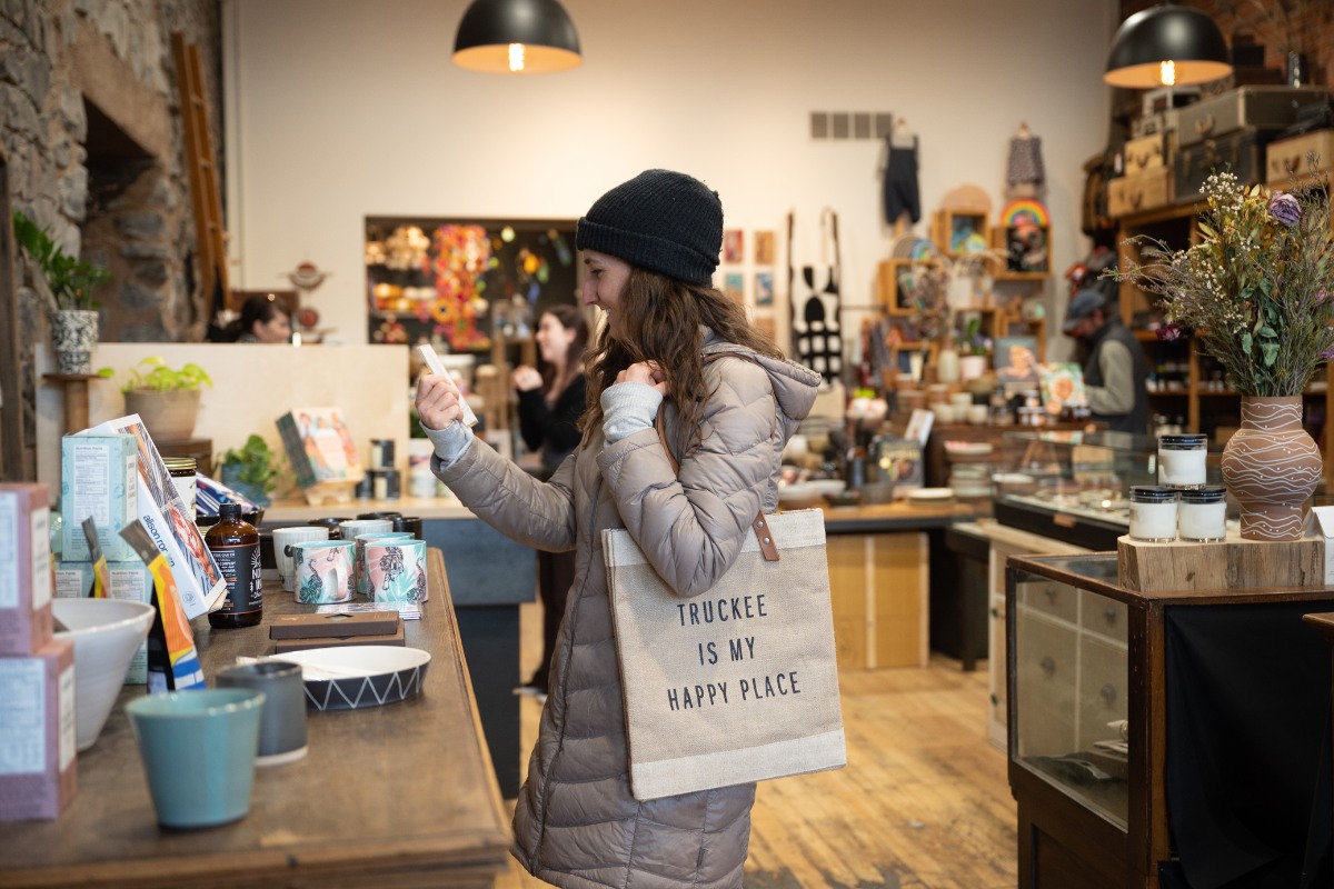 Woman shopping local at a boutique in Truckee.