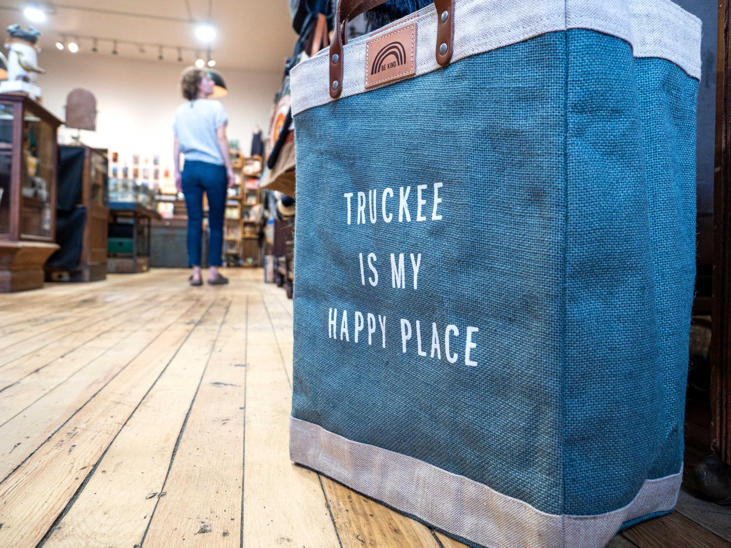 Store interior with bag stating, "TRUCKEE IS MY HAPPY PLACE."