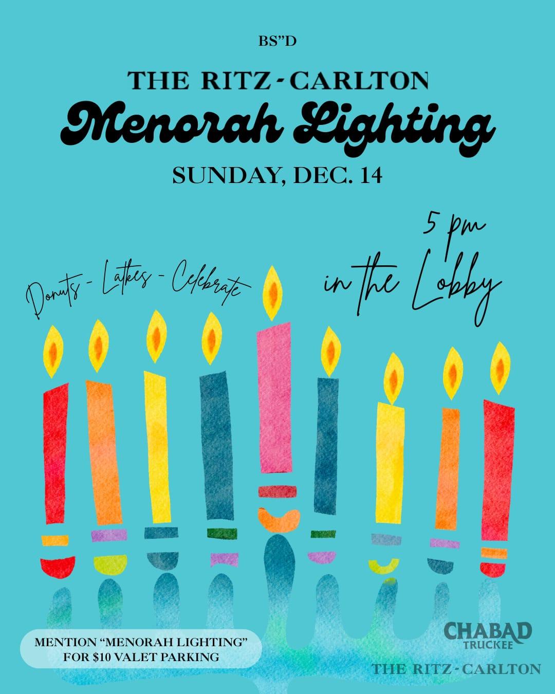 Colorful menorah with lit candles on a blue background.