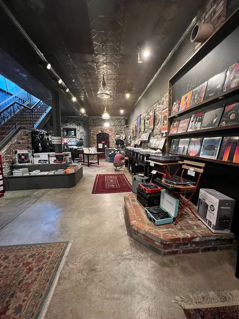 Record store interior with vinyl displays and a vintage decor.